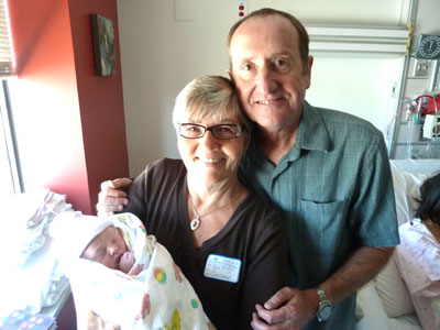 Happy Grandparents with Charlotte