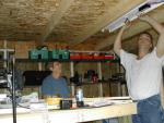Jonnie and Mike installing electric in the shed.
